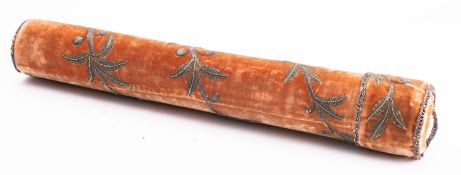 An ochre velvet and white metal wirework