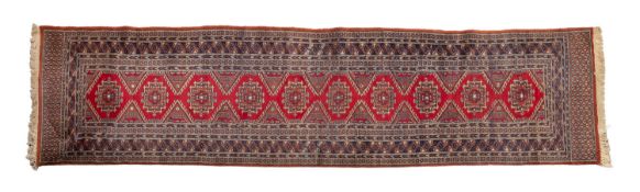 An Indo-Persian runner, the wine hooked