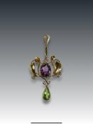 An Antique Art Nouveau Amethyst, Peridot and 9 ct Yellow Gold Pendant circa 1910, set to the