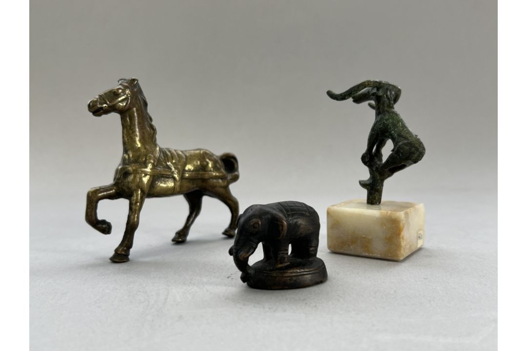 Three bronze Beasts, 19th century and earlierincluding a prancing horse, an elephant, and a Luristan - Image 2 of 7