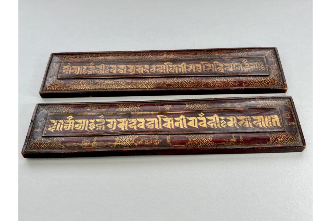 A Pair of inscribed Sutra Covers, Nepal, 19/20th centuryin gilt on red, the inscription with - Image 4 of 5