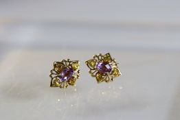 A Pair of Briolette Amethyst and Citrine Cluster Earrings mounted in 9 ct yellow gold. 13.4mm.x 11.