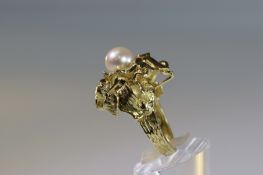 An Alan Gard 18k Gold and Pearl Ring, signed AMG dated 1967.size o size o