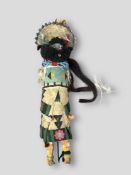 A Zuni Kachina Doll. USA ca. late 19th century.The Zuni kachina depicting â€˜Shakaloâ€™ wearing