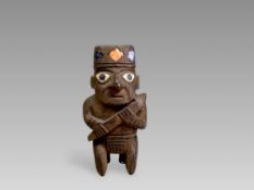 A Huari Wari Culture Wooden Figurine. Peru ca. 500-1000 AD.A wonderful wooden carving representing a