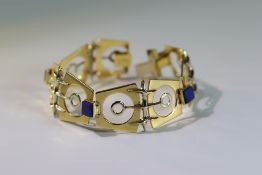An Italian 18k Gold Bracelet set with Lapis lazuli, designed by Galoppi. Fully signed. Weight 44.