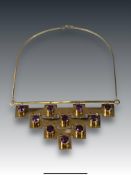 A Striking 18k Gold and Amethyst Necklace,. circa 1970s, designed by the Ecuadorean artist