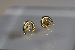 A Pair of Diamond Set Yellow Metal Cornucopia Scroll Earrings A Pair of Diamond Set Yellow Metal