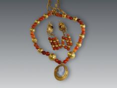 An Ancient Style  22 ct Gold and Carnelian Necklace with carved Agate Cameo, in a 22 ct gold and