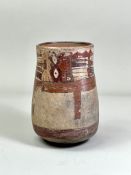 A Nasca Culture beaker. Peru ca. 200-600 AD.The beaker decorated with two mythical beings, each