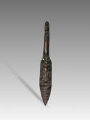 A Maori Wooden Ceremonial Waka Hoe with Hei Tiki. New Zealand Early 20th CenturyA ffine ceremonial