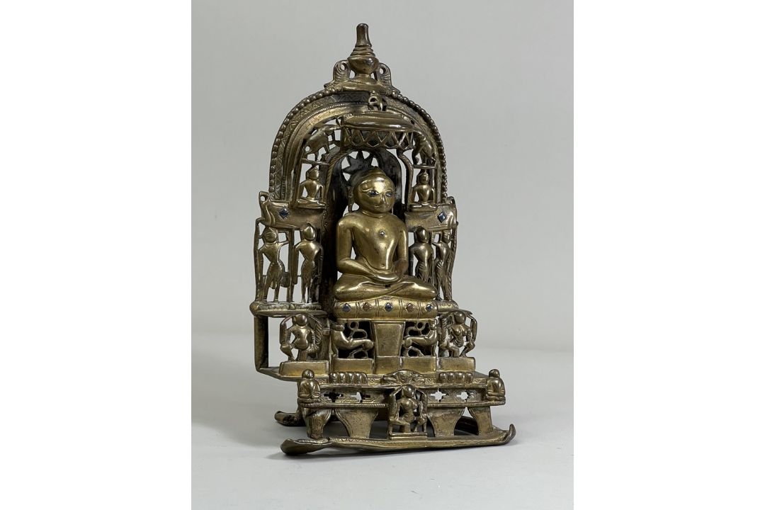 A Bronze Jain shrine. India 15th century.A Jain shrine depicting a Tirthankara with silver inlaid - Image 5 of 18