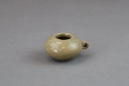 A Longquan Yellow-glazed Bird Feeder, Song dynasty