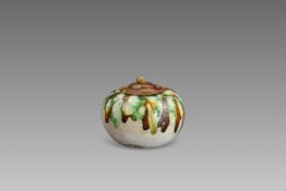A Sancai-glazed Pottery Waterpot and Cover, Tang dynasty