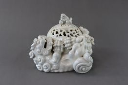 A Hirado Whiteware Lion and Ball Censer and Cover, 19th century