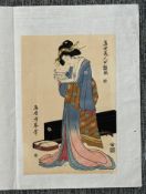 A ukiyo-e print 'Courtesan standing reading a scroll', signed Torii Kiyomine, 19/20 century.