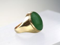 A large jadeite and 18ct gold signet ring