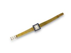 A Gubelin 18k gold watch