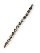 An Antique Silver Bracelet with Roman style coin panels