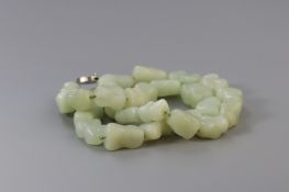 A Large Jade  Buddha s Teeth  Necklace, c.1900