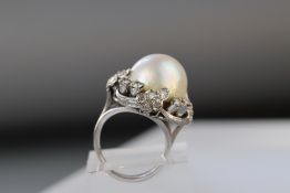 A vintage pearl and diamond ring, in 18k white gold
