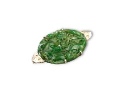 A vintage jadeite and diamonds brooch