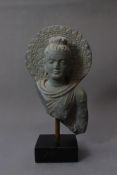 A Gandhara Grey Schist Figure of Buddha, 3rd-4th Century