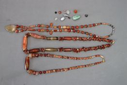 Three Carnelian and Banded Agate Necklaces of Tibetan type