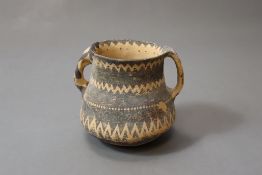A Chinese Majiayao Painted Pottery Jar with double Handles, Neolithic