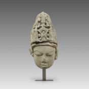A Fine Stone Carving of Vishnu Head. India, ca: 11th/12th Century.