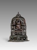 A bronze Jain shrine with rubies and silver inlay. India, 15th century.