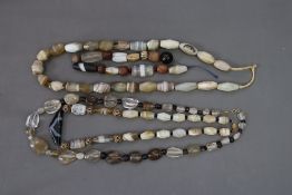 Three Hardstone Beaded Necklaces and a Bracelet of Tibetan Type, Ancient and later