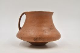 A Large Red Pottery Handled Cup, Neolithic period, Qijia culture, 2050 - 1700 B.C.