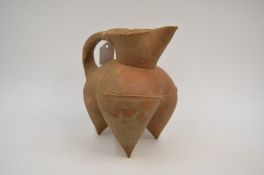 A Red Pottery Tripod Ewer, Neolithic period, Dawenkou culture, c. 4300-2400 BC