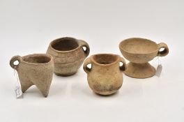A Group of Four Small Handled Cups, Neolithic period