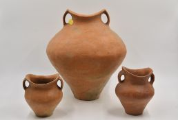 Three Red Pottery ??Saddle-mouth?? Handled Jars, Neolithic Period, Siwa culture, c. 1350 BC