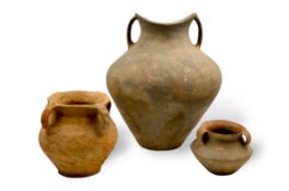 Three Grey Pottery ??Saddle-mouth?? Handled Jars, Neolithic Period, Siwa culture, c. 1350 BC