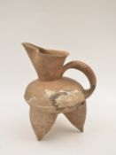 A Red Pottery Tripod Ewer, Neolithic period, Dawenkou culture, c. 4300-2400 BC