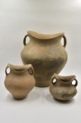Three Grey Pottery ??Saddle-mouth?? Handled Jars, Neolithic Period, Siwa culture, c. 1350 BC