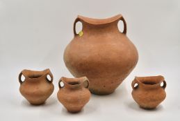 Four Red Pottery ??Saddle-mouth?? Handled Jars, Neolithic Period, Siwa culture, c. 1350 BC