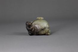 A Ming style Jade Boy and Pomegranate Group, 19th century,