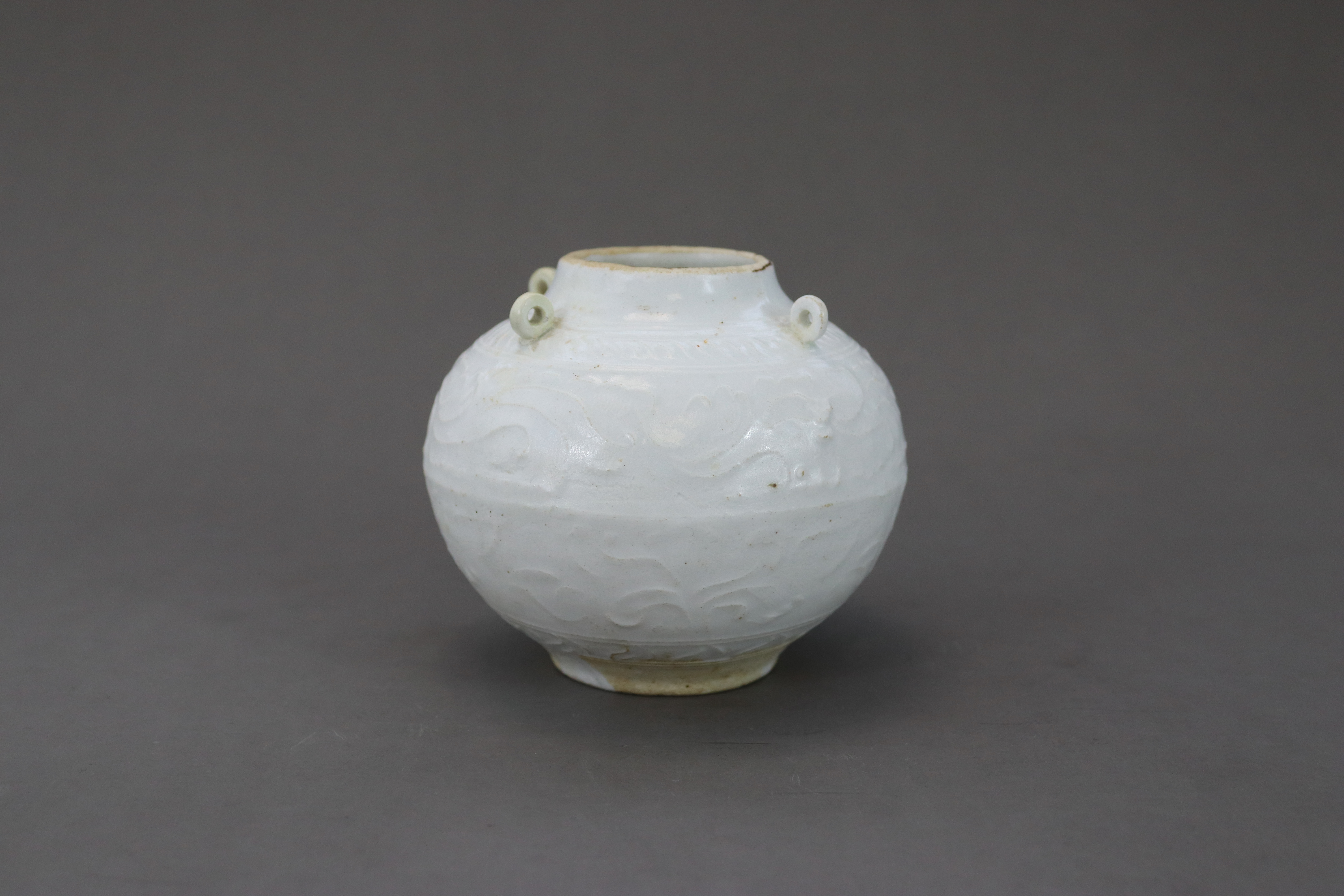 A White-glazed Globular Handled Waterpot, Song dynasty