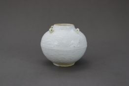 A White-glazed Globular Handled Waterpot, Song dynasty