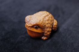 A Fruitwood Toad Okimono, signed Masanao, Meiji period,
