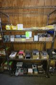 Assortment of Electrical Items on (4) Shelves Including Assortment of Power Supplies Including (2)