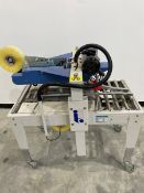 Interpack Top/Bottom Case Sealer. Model: USC 2020-TB. Serial: H 03 T124013. 115 Volts, 60 Hz, 1