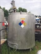 USED 1100 GALLON STAINLESS STEEL HEATED MIX TANK.