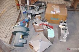 Contents on Floor inc capacitors, motors, etc