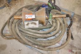 Metal conveyor roller and hydraulic hose