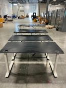 (4) Fully Adjustable Electric Standing Desks. 27